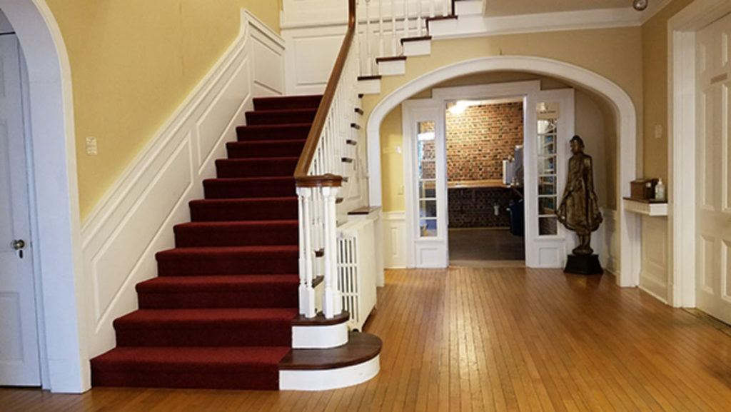 Red carpet in hallway of Retreat Center