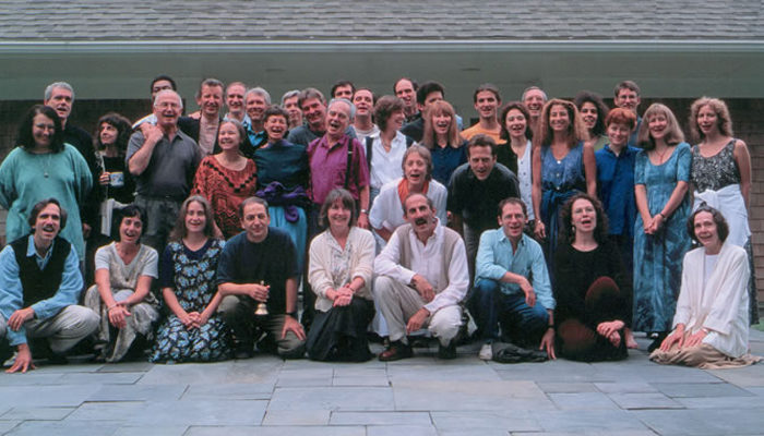 Vipassana teachers in the West gather together to meet and discuss relevant dharma topics every four years. Here they are shown at the Barre Center for Buddhist Studies in 1996.