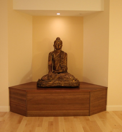 The Buddha statue in the new lower Karuna House walking room, 2013.